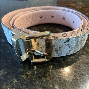 Michael Kors pink and logo belt. Size L, excellent condition.
